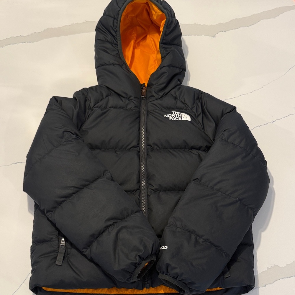 The North Face Kids Black Puffer Jacket with Bright Orange Interior